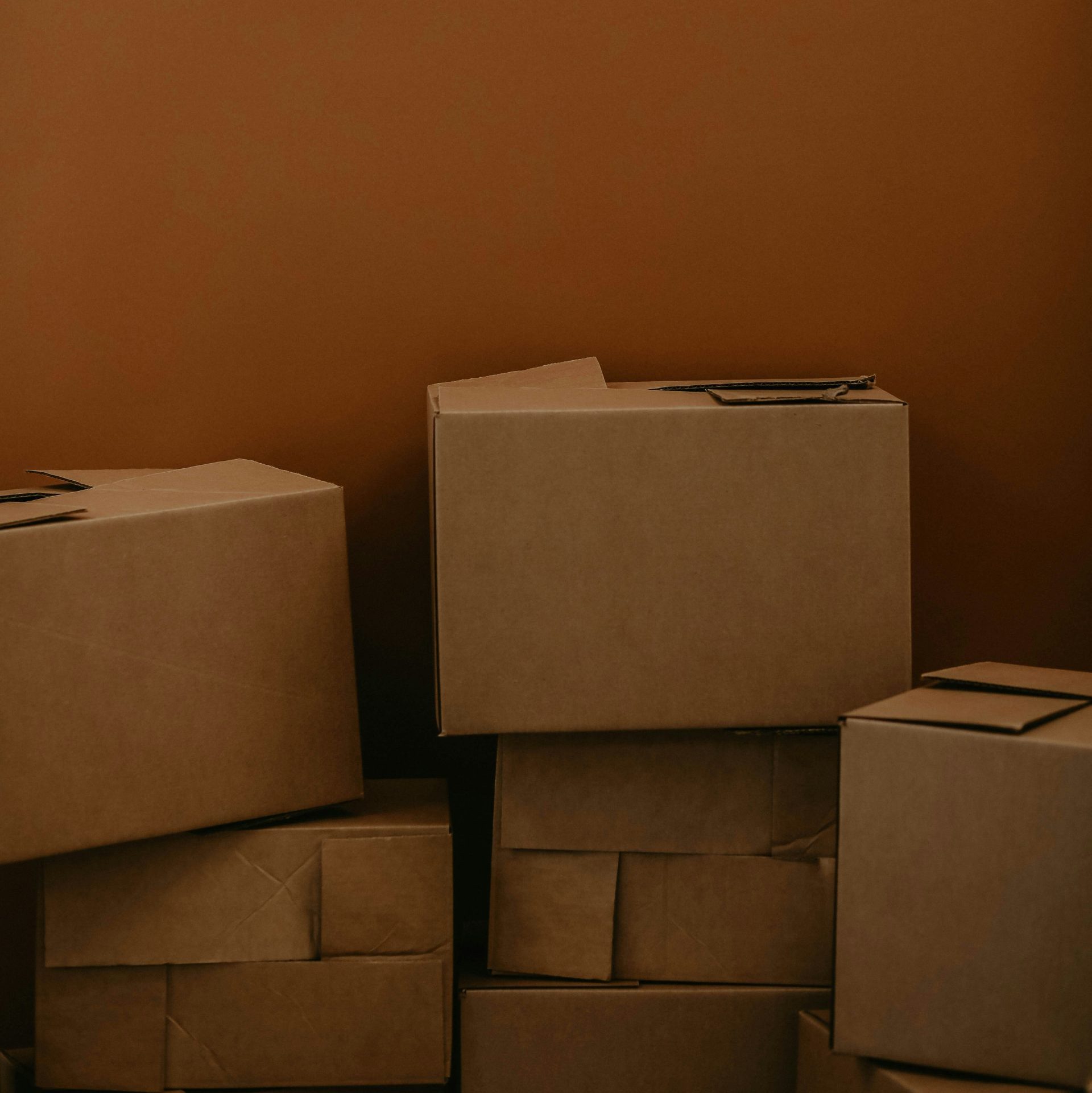 white cardboard box on brown wooden table